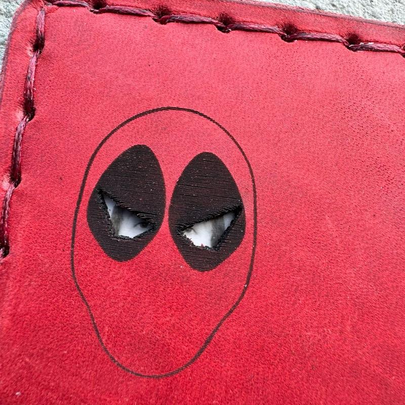 Handmade, hand sewn leather wallet card holder featuring red Hero