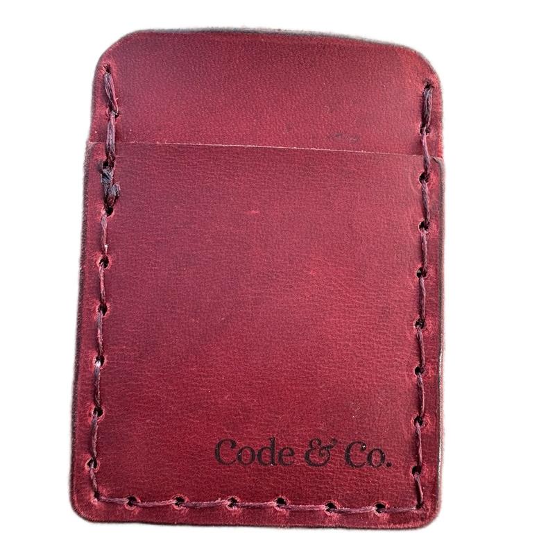 Handmade, hand sewn leather wallet card holder featuring red Hero