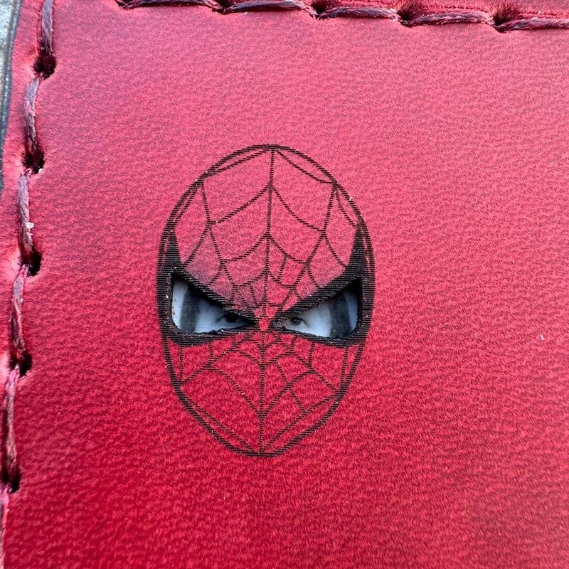 Handmade, hand sewn leather wallet card holder featuring red Hero