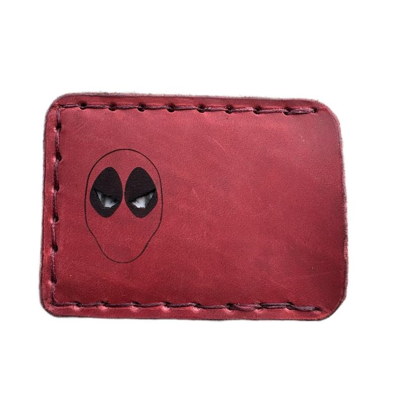 Handmade, hand sewn leather wallet card holder featuring red Hero