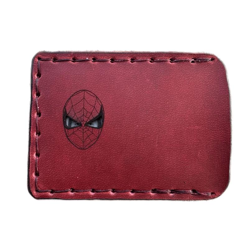 Handmade, hand sewn leather wallet card holder featuring red Hero