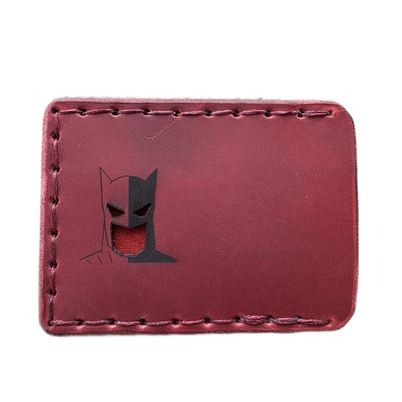 Handmade, hand sewn leather wallet card holder with face mask featuring Batguy