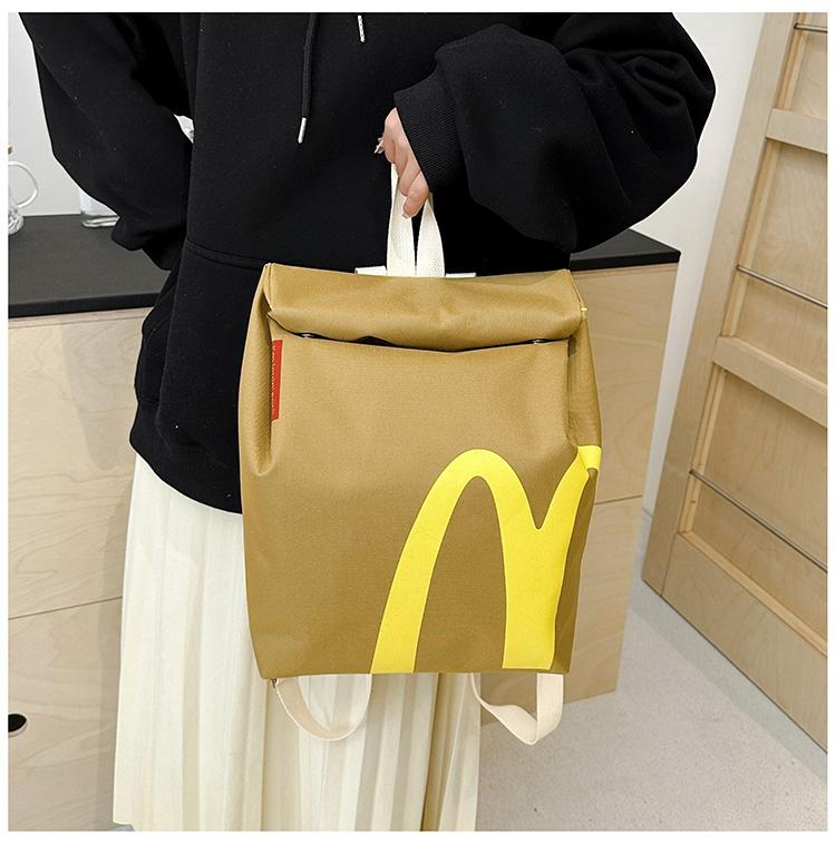 Necessary for starting school  backpack paper bag large-capacity student bag Messenger bag for men and women with the same paragraph.