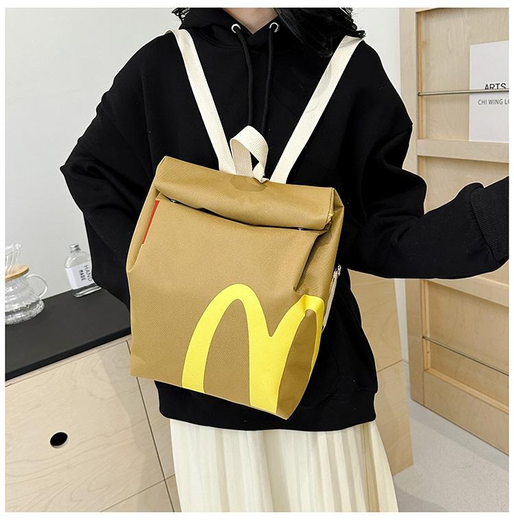 Necessary for starting school  backpack paper bag large-capacity student bag Messenger bag for men and women with the same paragraph.