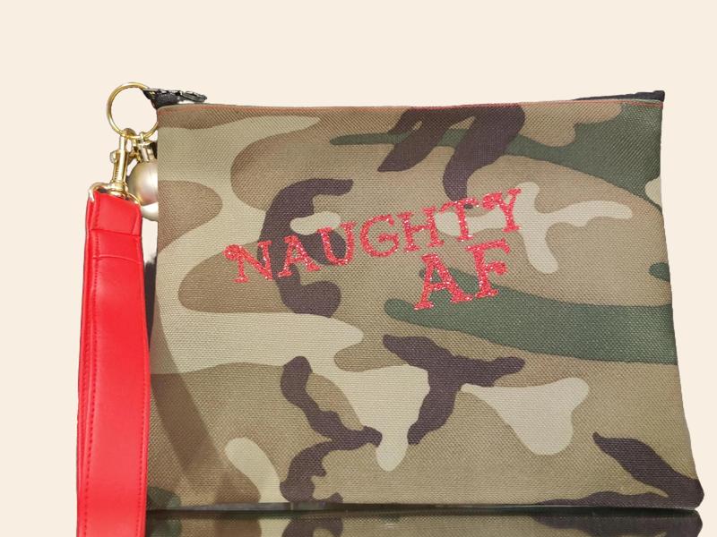 Women's Camouflage Print Zipper Wristlet with Red Glittery 'Naughty AF' Text and Silver Ornament Charm