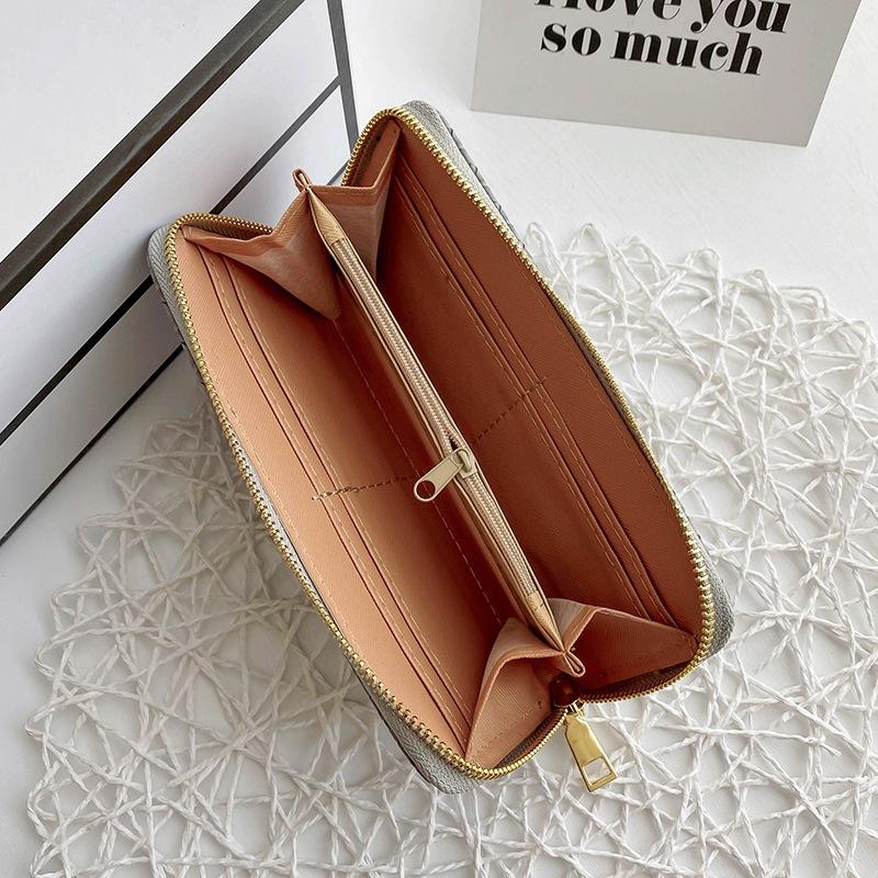 European and American style fashion PU leather woven wallet, zero wallet, new trendy women's wallet, medium to long zipper handbag